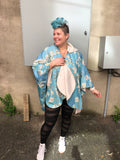 “Almond Blossom” Rain Cape